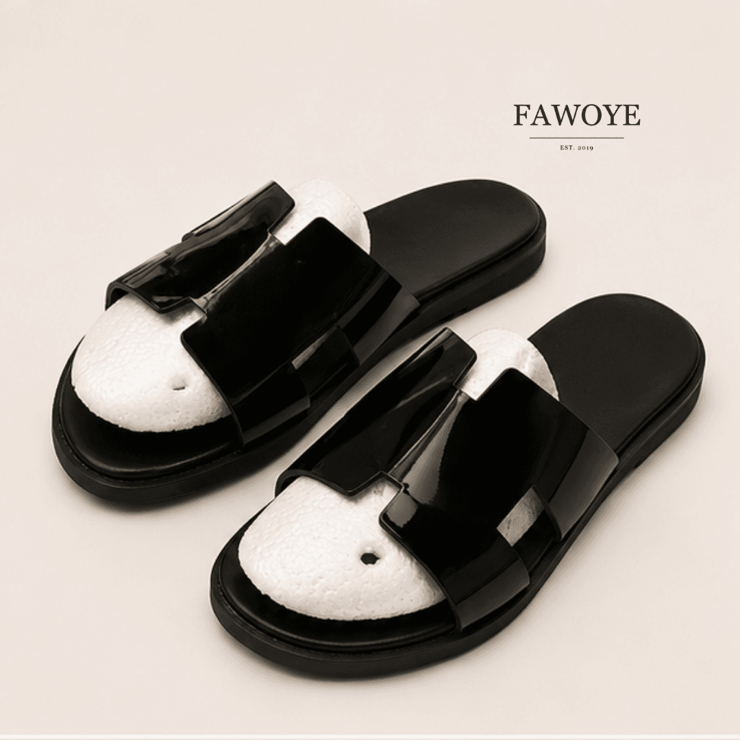 Black smooth-leather H-band slides showing the finished upper