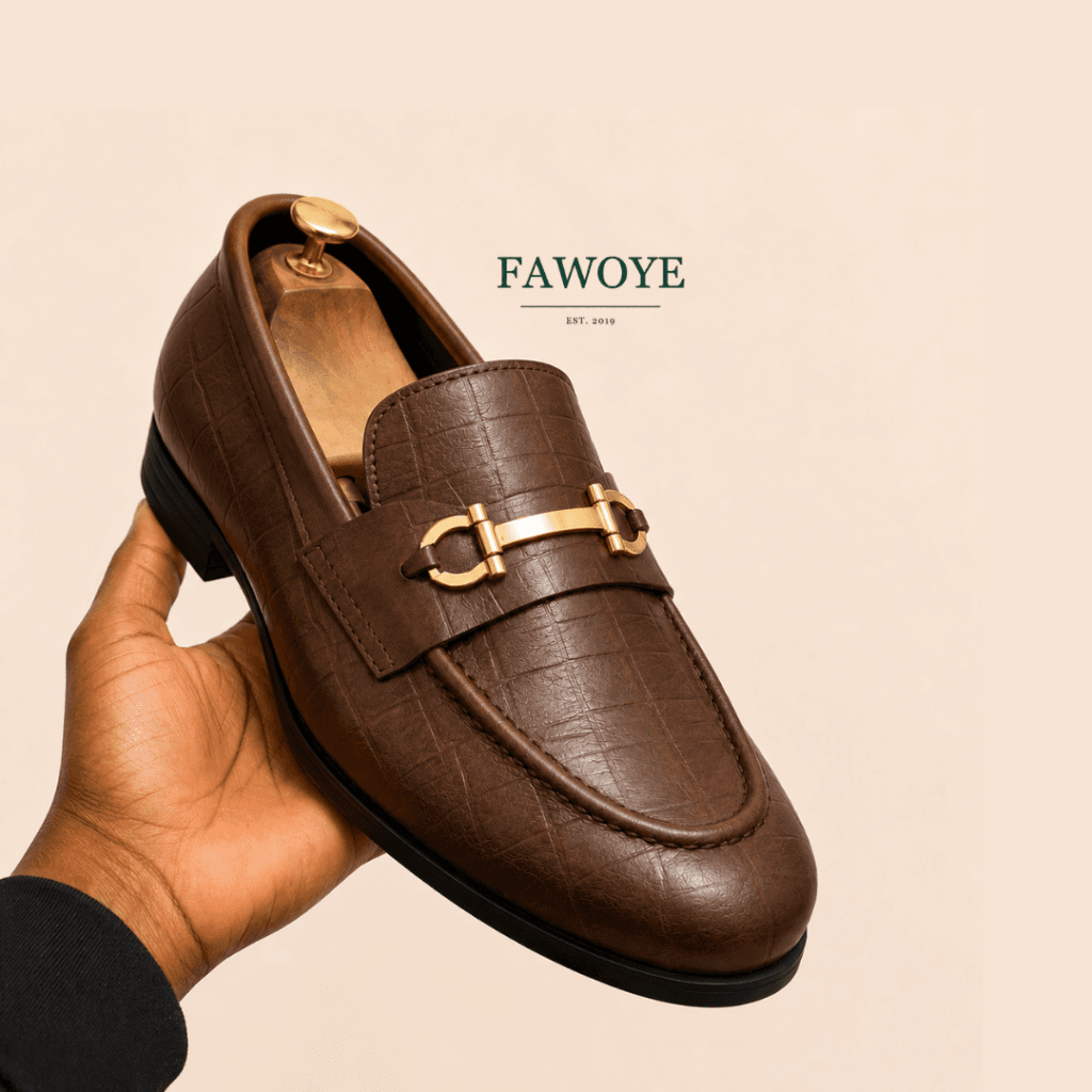 Brown horsebit loafers with crocodile-textured leather for kaftan styling