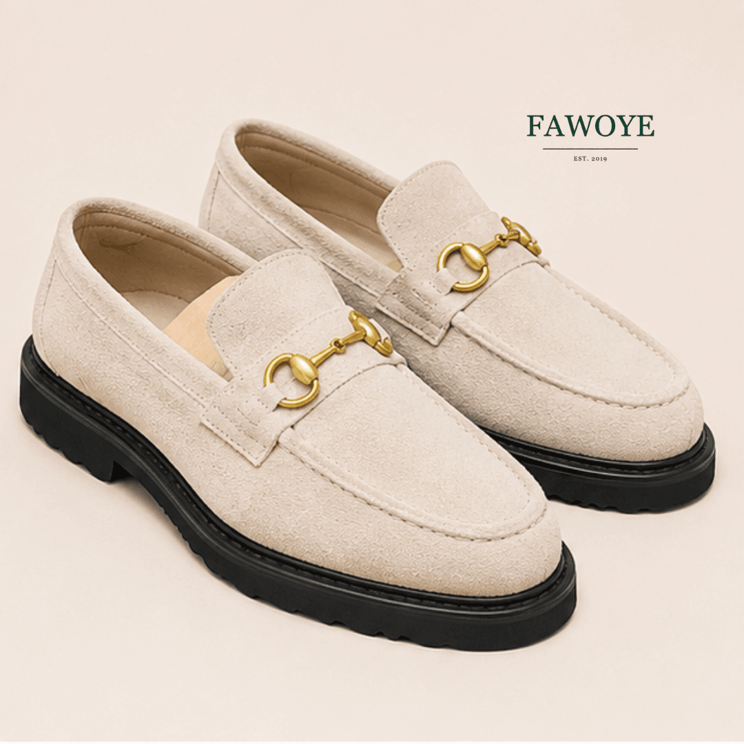 Cream horsebit loafers made with suede
