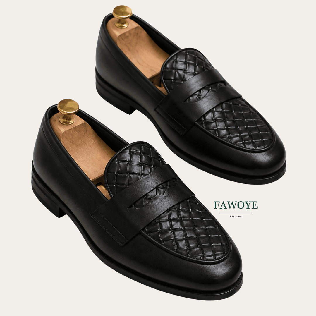 Black loafer with a woven leather upper