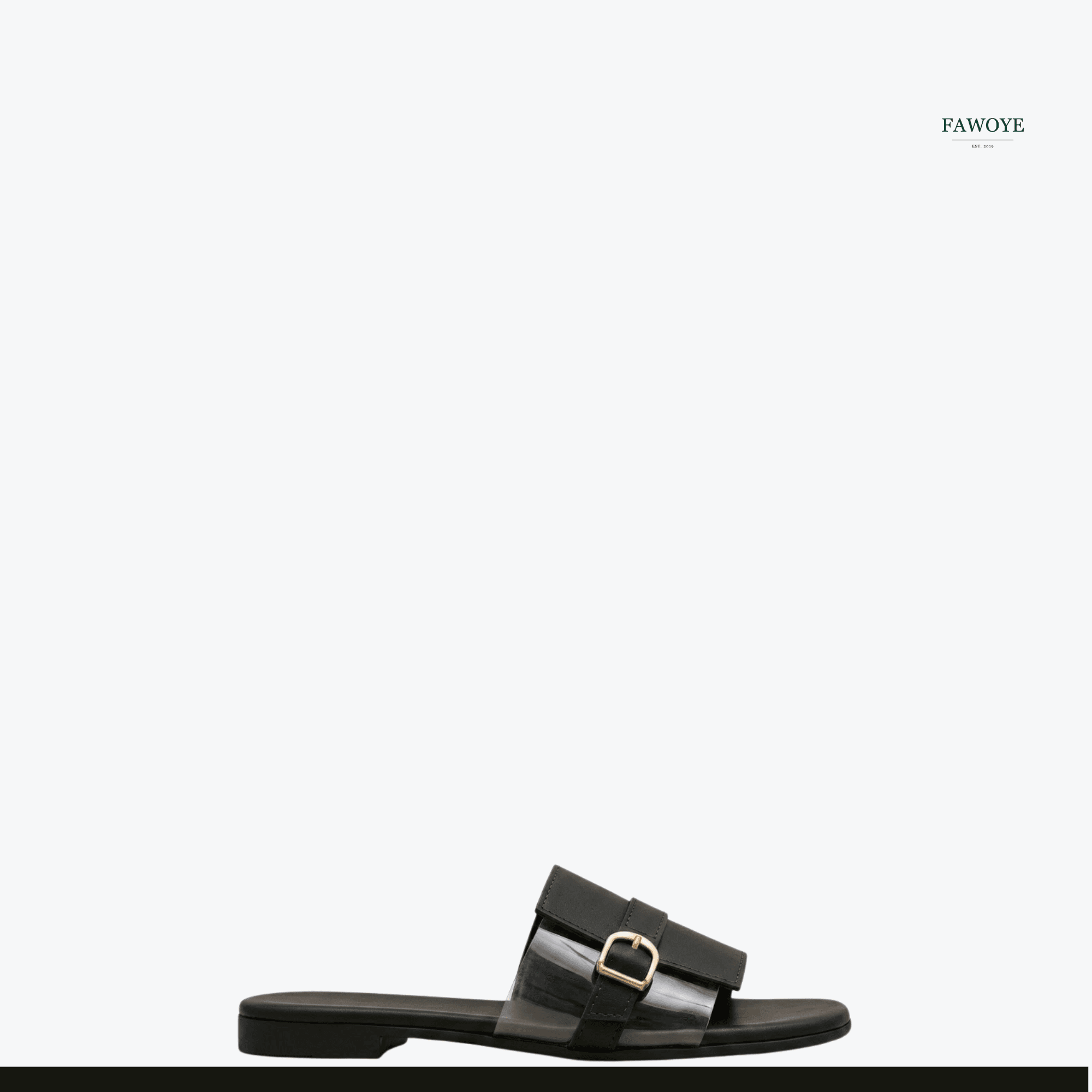 Women’s slide with a leather sole and transparent single strap