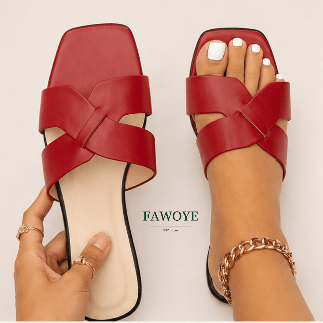 Red cross-strap slides for a colourful casual look