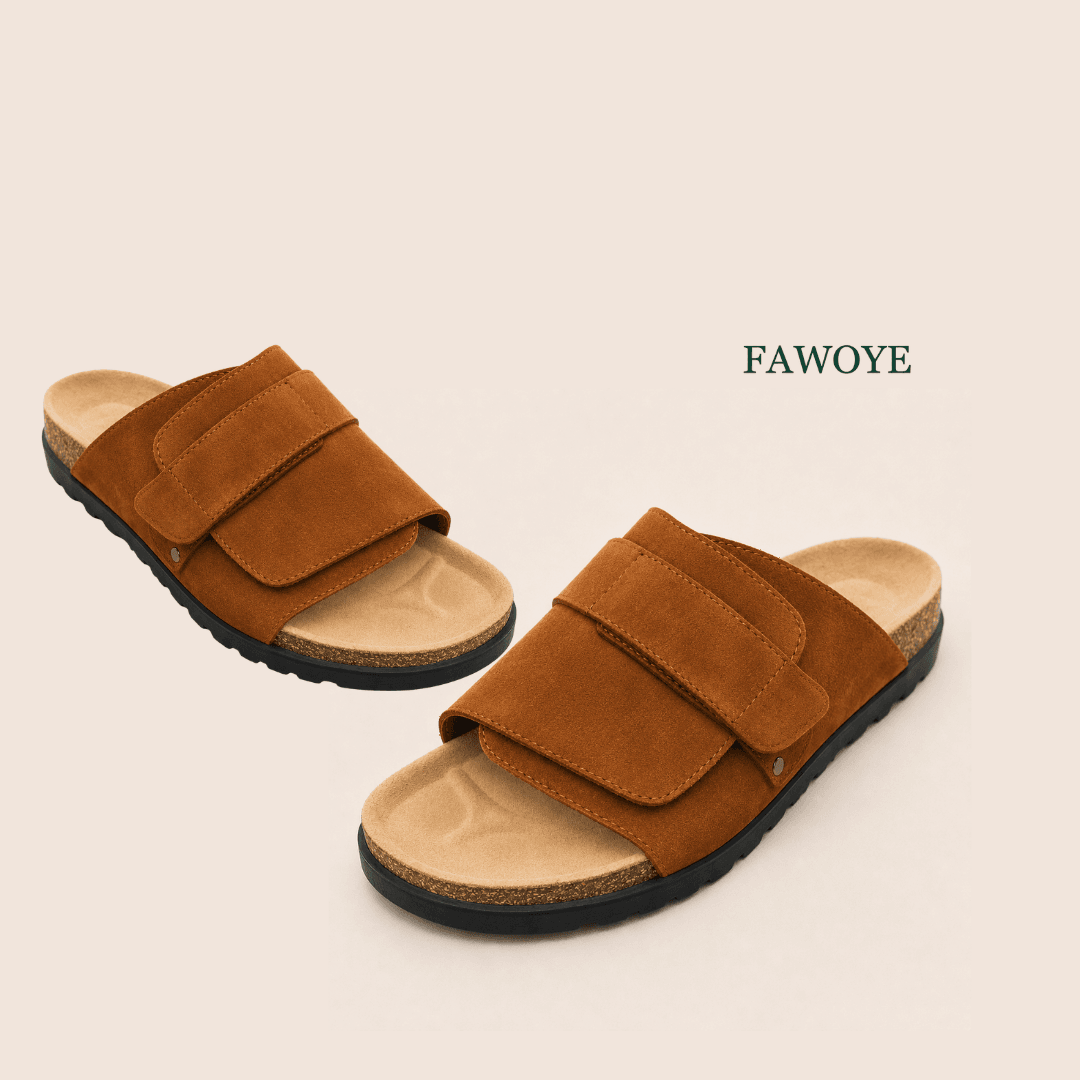 Tan two-strap suede slides with adjustable buckles