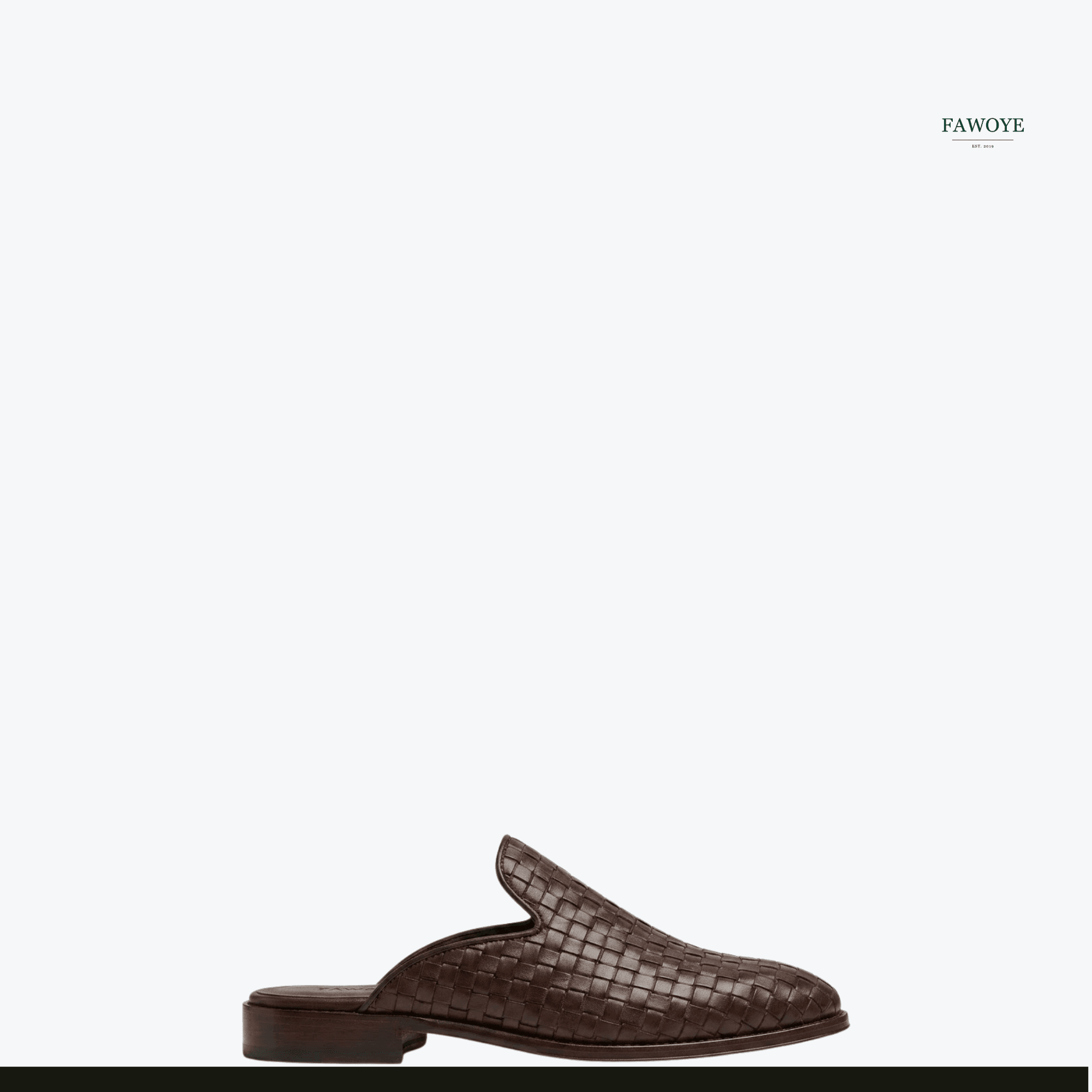 Woven textured mules demonstrating detailed shoe construction